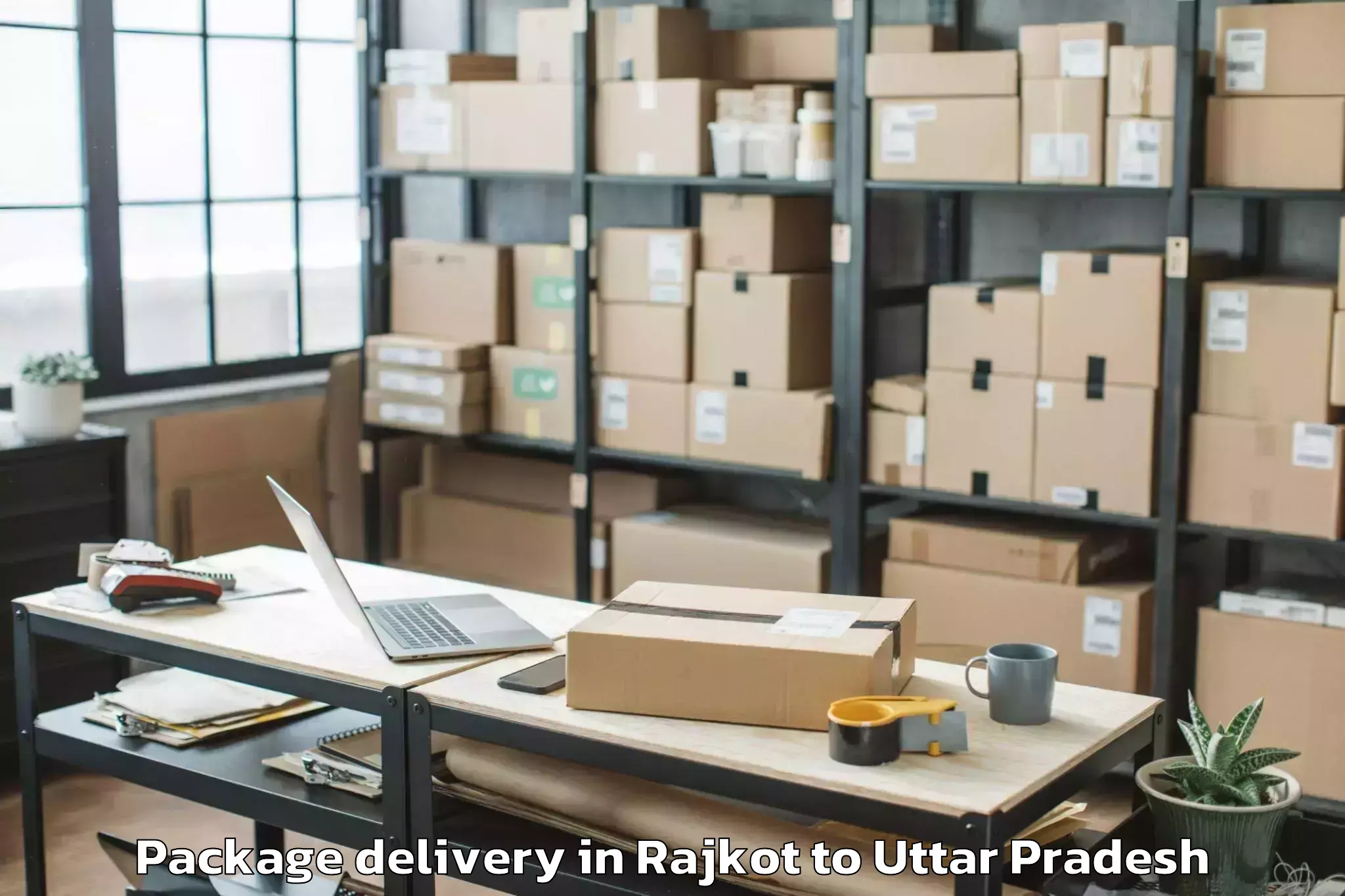 Book Rajkot to Lalganj Ajhara Package Delivery Online